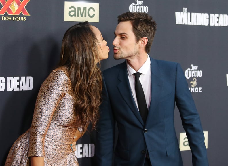 UNIVERSAL CITY, CA - OCTOBER 02:  Amber Stevens (L) and actor Andrew J. West arrive at AMC's 