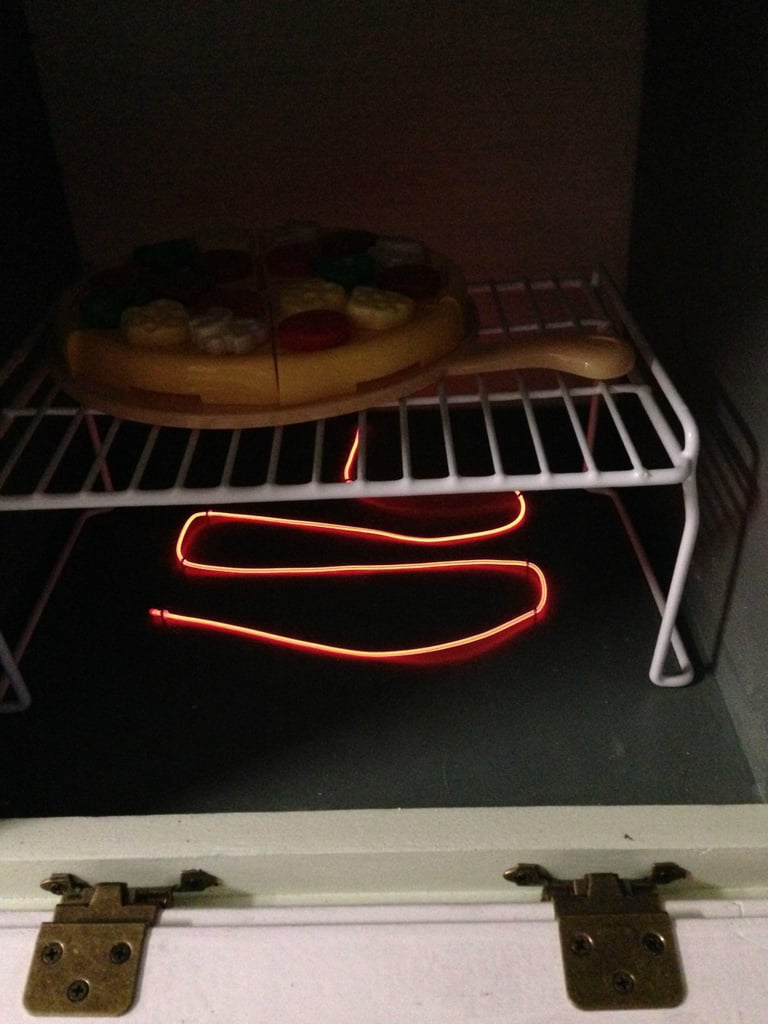 They tested the appliances by baking a toy pizza.