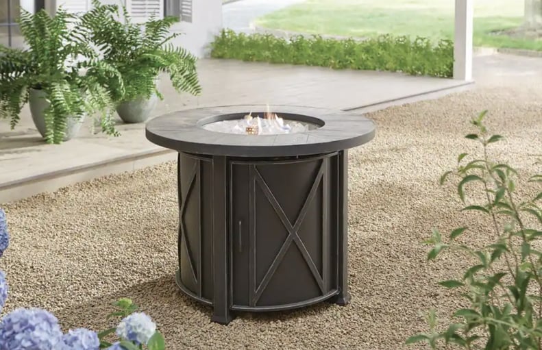 A Round Table: Hampton Bay Park Canyon 35 in. Round Steel Propane Fire Pit