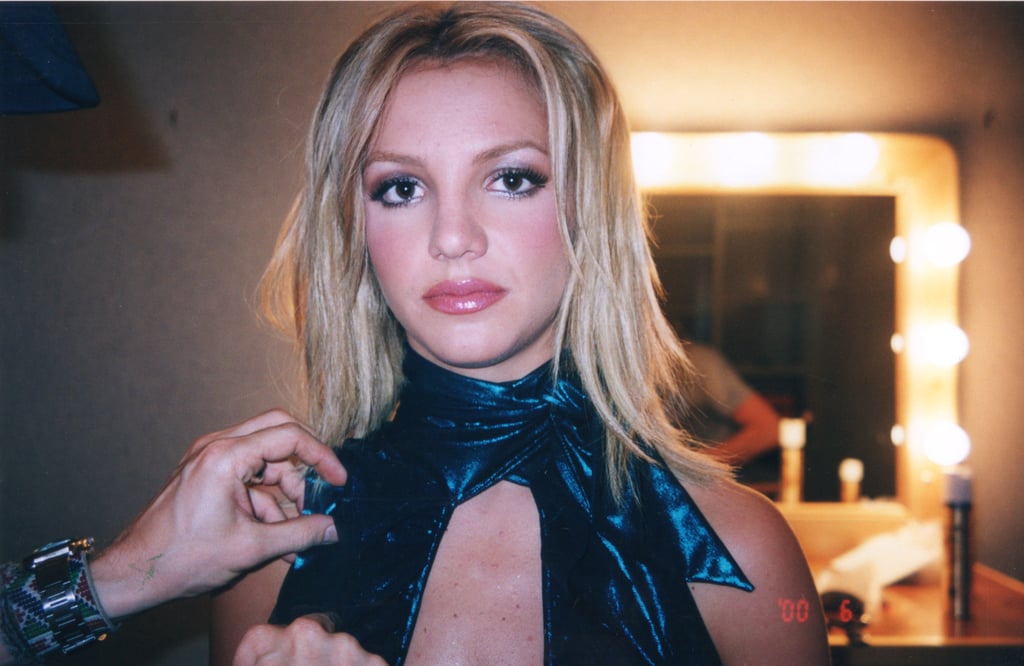 Britney was shamed for her sexuality at a young age. The documentary presented clips from past interviews, in which the singer was criticized for everything, from the clothing she wore to her lyrics (some of which she didn't even write, by the way), and asked about her virginity and her breasts. Her former stylist, Hayley Hill, noted that she worked with "all the big boy bands" too, and none of them were treated with the scrutiny that Britney was under. 
The paparazzi were relentless with Britney. Even during her very public breakdown, they never left her alone. And to this day, they don't seem to realize the immense amount of damage they inflicted on her. "I don't really think, and I don't really believe, [the paparazzi being around affected her at all]  because . . . working on her for so many years, she never gave a clue or information to us that, 'I don't appreciate you guys. Leave me the eff alone," photographer Daniel Ramos said. 
The singer may one day tell her story. Despite the fact that Britney has remained silent about her conservatorship, Culotta believes the singer will eventually get the opportunity to break her silence. "I know she will," Culotta said. "And I am so grateful for when that point comes that she's able to sit down, and, you know, everything will fall into place."