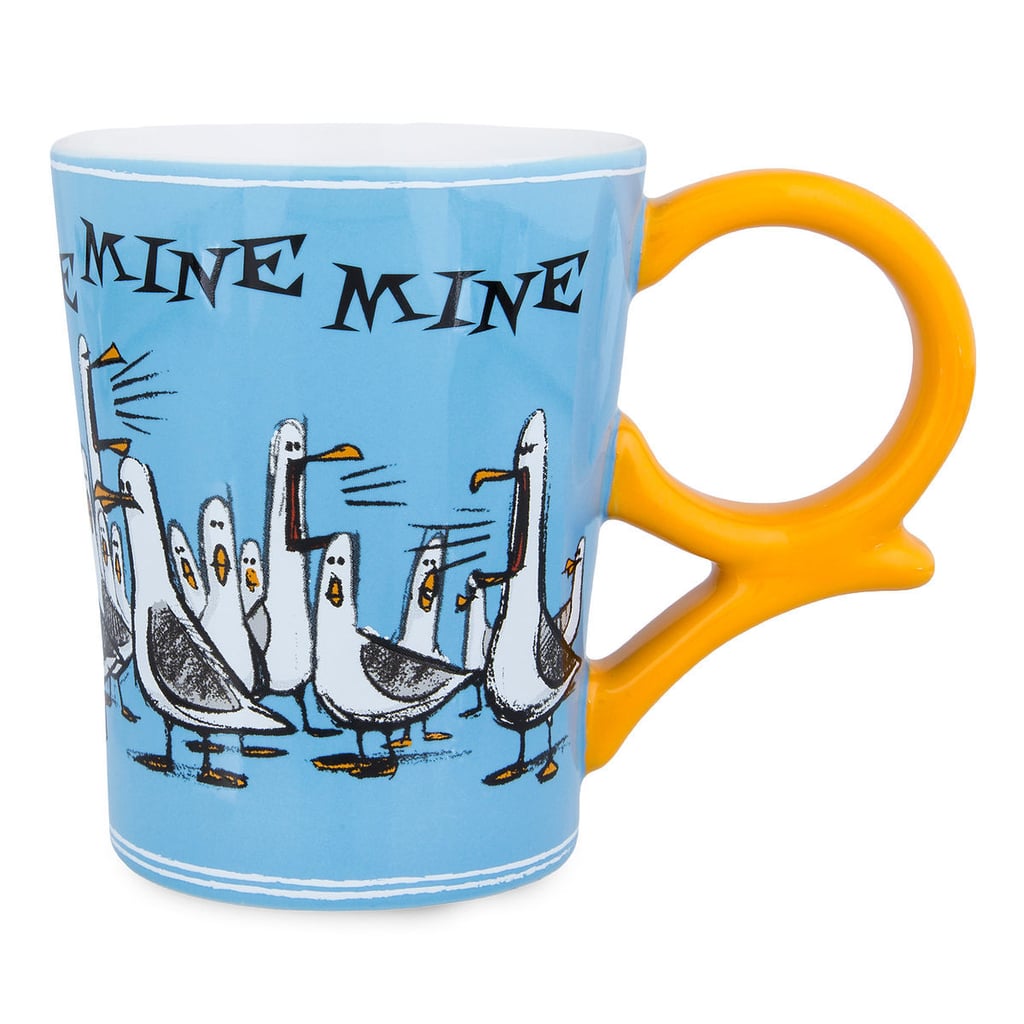If the lovable birds above the sea were your favorite part of Finding Nemo, this Finding Nemo Seagulls Mug ($17) is definitely for you.