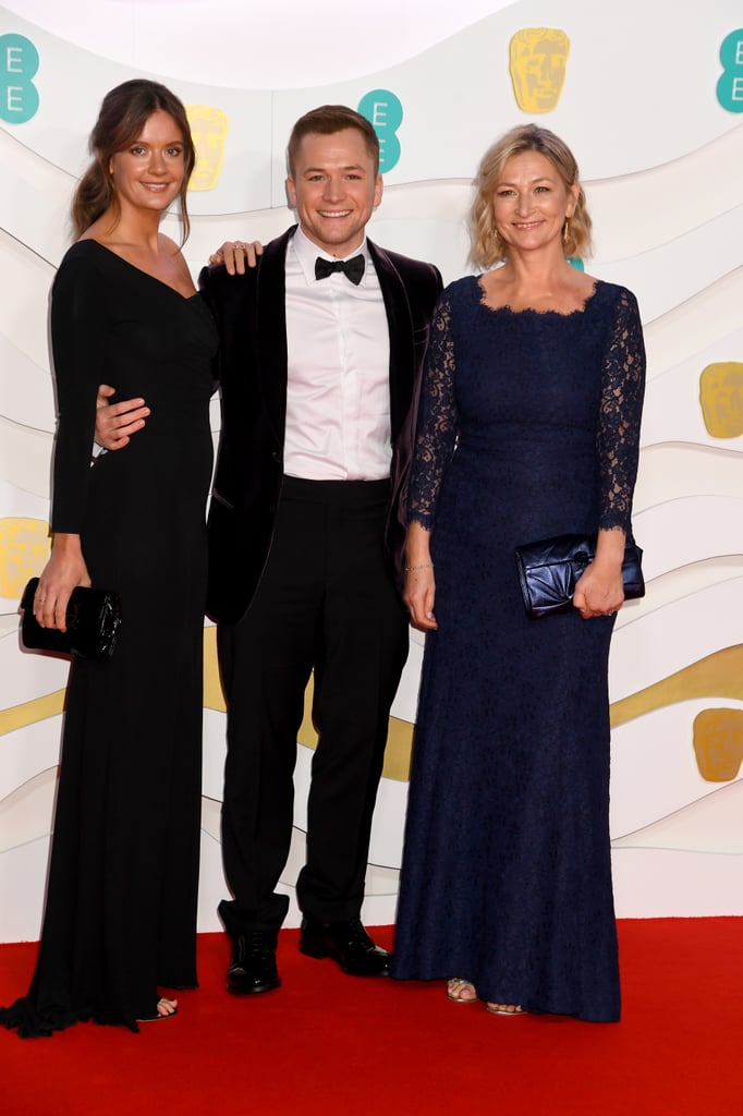 Emily Thomas, Taron Egerton, and Christine Egerton at the 2020 BAFTAs