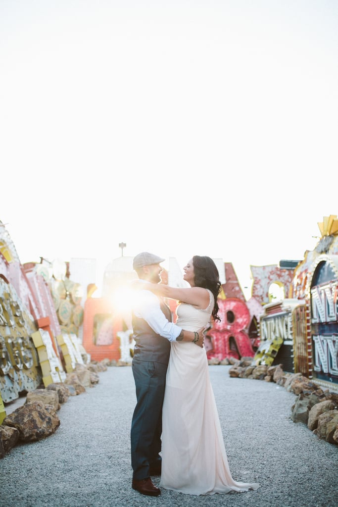 "I loved this image because of that perfect sun coming in through a retired neon sign in a graveyard for old signs of Las Vegas. A Neon Graveyard, which was such a unique experience. Each couple is so unique, and I love when they can show their uniqueness on their wedding day." — Gabriel Gastelum