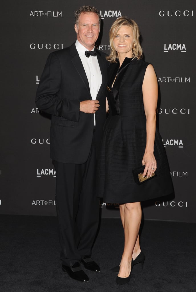 Will Ferrell and Viveca Paulin coordinated in black.