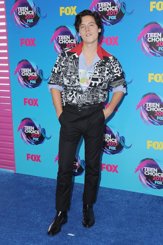 Wearing a Graphic Tee and Trousers