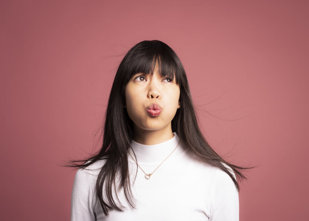 A Hairstylist's Tips For Cutting Your Bangs