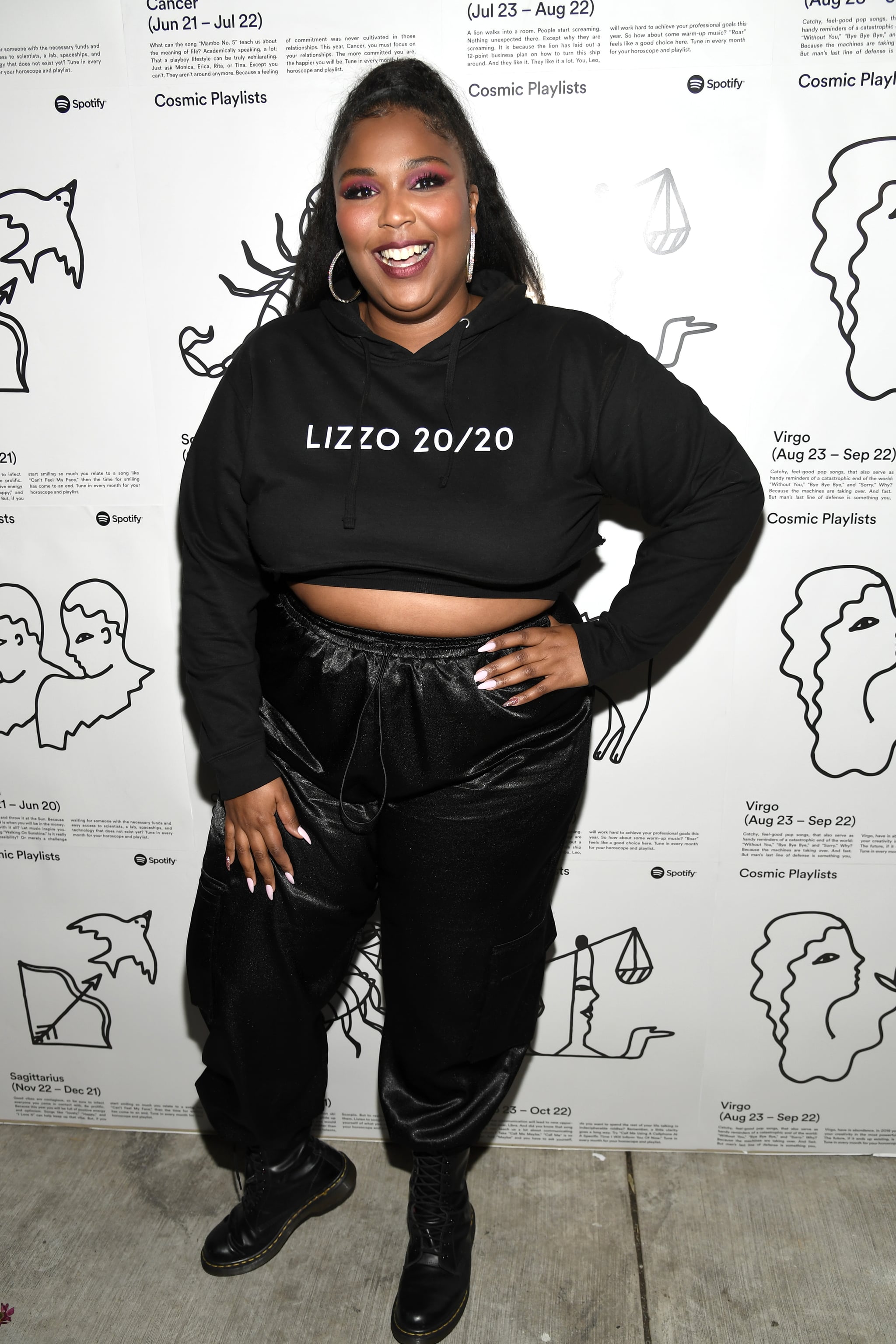 Of course, Lizzo looks amazing in her own merch., Heaven Help Me — Lizzo  Has Served Up SO Many Gorgeous Looks, and I'm Taking All the Notes