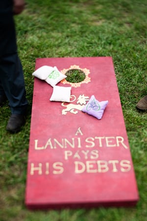 We spotted these Thrones-themed lawn games at a Southern wedding.