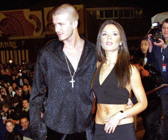 In January 2001, Victoria bared her belly with David by her side at ...