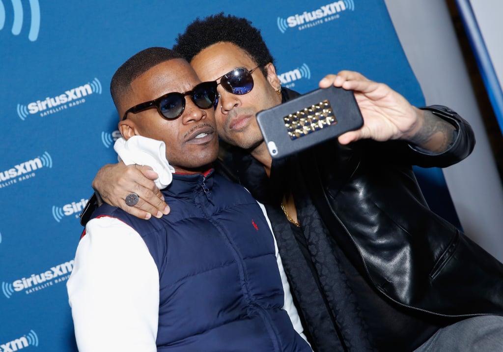 Jamie Foxx and Lenny Kravitz took a selfie at the SiriusXM spot at the Super Bowl XLIX Radio Row.
