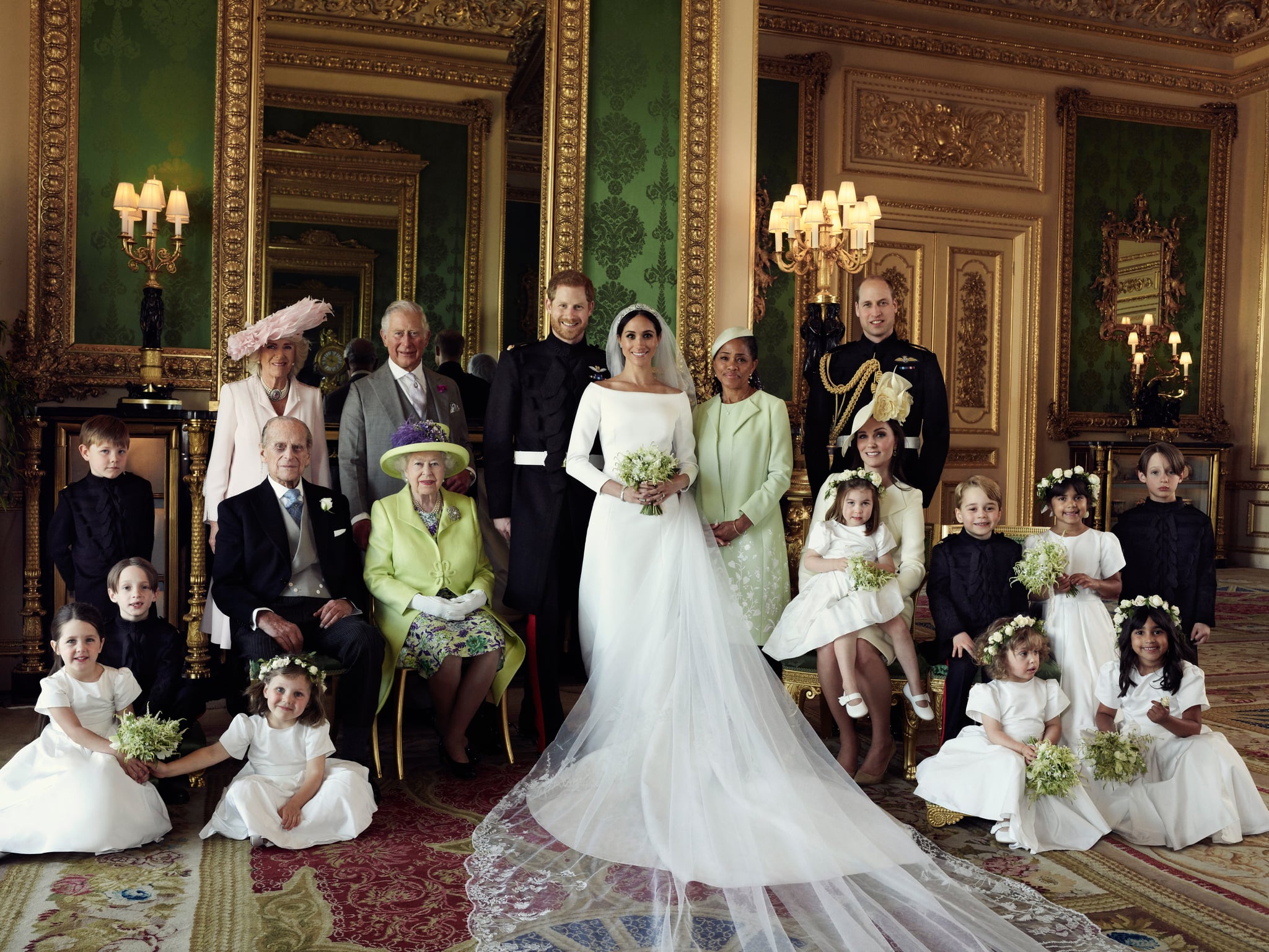 WINDSOR, UNITED KINGDOM - MAY 19: In this handout image released by the Duke and Duchess of Sussex, the Duke and Duchess of Sussex pose for an official wedding photograph with (left-to-right): Back row: Master Jasper Dyer, the Duchess of Cornwall, the Prince of Wales, Ms. Doria Ragland, The Duke of Cambridge; middle row: Master Brian Mulroney, the Duke of Edinburgh, Queen Elizabeth II, the Duchess of Cambridge, Princess Charlotte, Prince George, Miss Rylan Litt, Master John Mulroney; Front row: Miss Ivy Mulroney, Miss Florence van Cutsem, Miss Zalie Warren, Miss Remi Litt in The Green Drawing Room at Windsor Castle on May 19, 2018 in Windsor, England. (Photo by Alexi Lubomirski/The Duke and Duchess of Sussex via Getty Images) NEWS EDITORIAL USE ONLY. NO COMMERCIAL USE. NO MERCHANDISING, ADVERTISING, SOUVENIRS, MEMORABILIA or COLOURABLY SIMILAR. NOT FOR USE AFTER 31 DECEMBER 2018 WITHOUT PRIOR PERMISSION FROM KENSINGTON PALACE. NO CROPPING. Copyright in the photograph is vested in The Duke and Duchess of Sussex. Publications are asked to credit the photograph to Alexi Lubomirski. No charge should be made for the supply, release or publication of the photograph. The photograph must not be digitally enhanced, manipulated or modified in any manner or form and must include all of the individuals in the photograph when published.