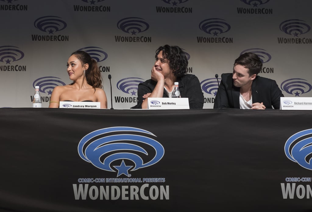 Pictured: Lindsey Morgan, Bob Morley, and Richard Harmon.