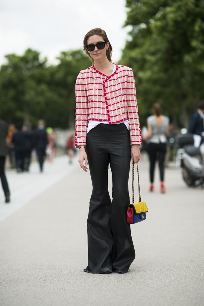 This showgoer topped her dramatic flares with a little Parisian flair — a tweedy jacket for just the right chic finish.
Source: Le 21ème | Adam Katz Sinding