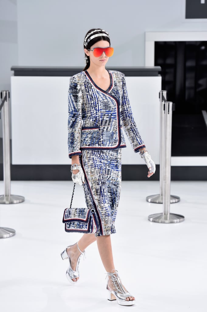 And showed off a flashy tweed suit that got played up with metallics and a coordinating handbag.