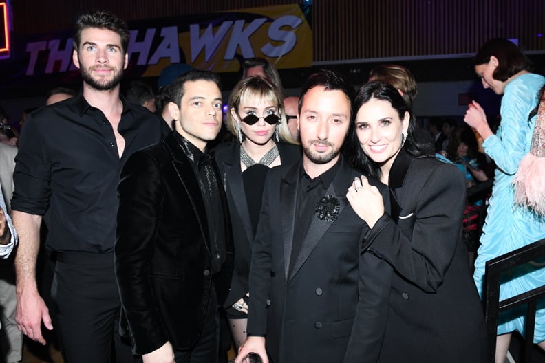 Liam Hemsworth, Rami Malek, Miley Cyrus, Anthony Vaccarello, and Demi Moore