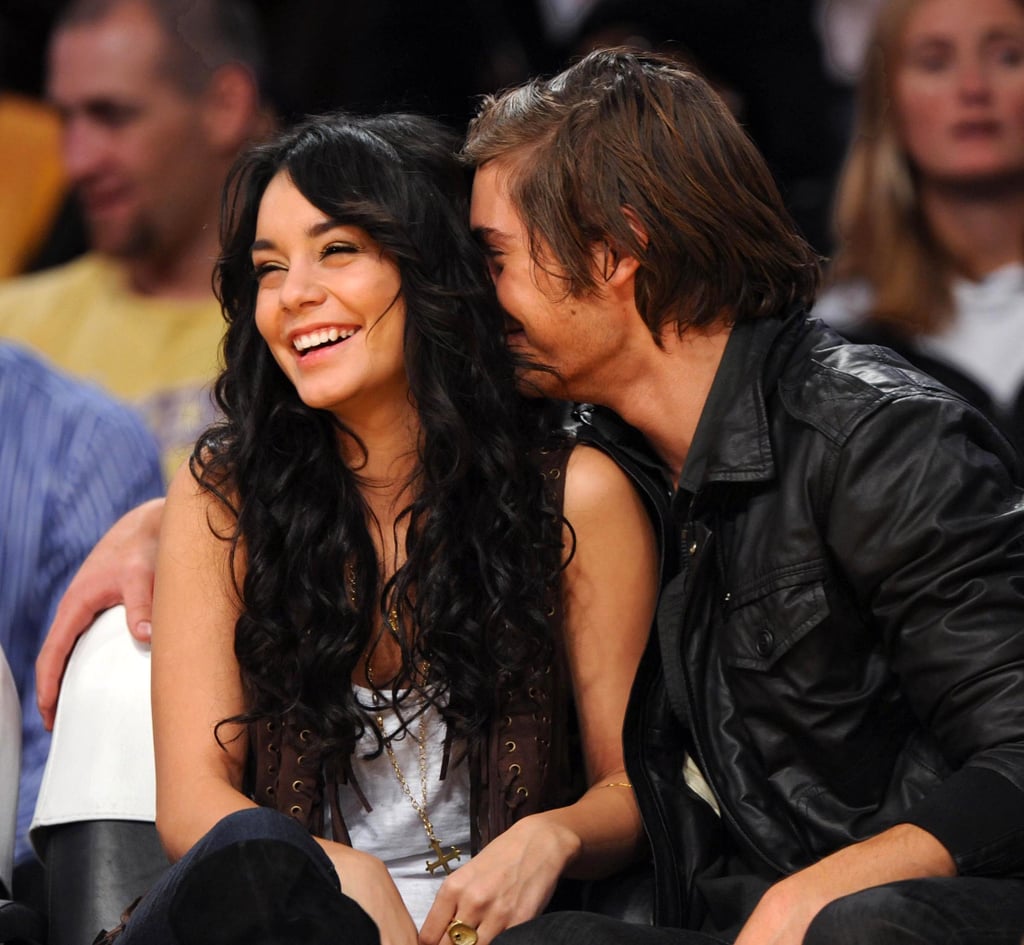 Zac whispered sweet nothings into Vanessa's ear when they caught a basketball game in December 2008.