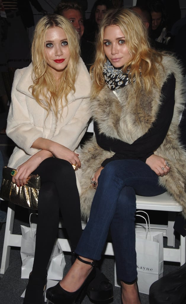 Twinning combo: The girls sat front row at the Jenni Kayne Fall 2007 show donning plush fur outerwear.

Mary-Kate styled her rich cream-colored coat with black leggings and chunky ankle boots. 
Ashley showed her support for Jenni Kayne donning a lavish fur vest from her collection with true-blue denim and ankle-strap pumps.