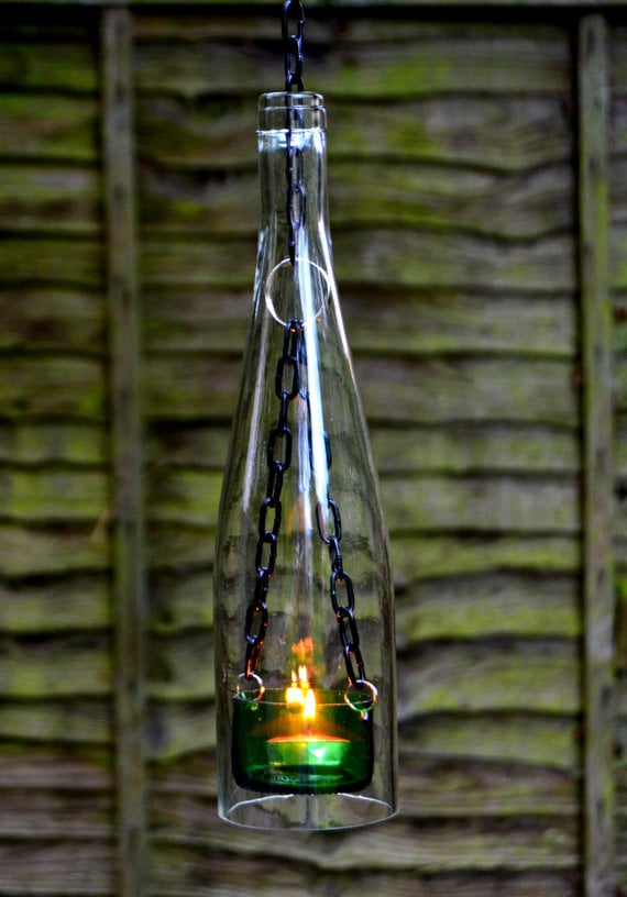 Upcycle an old wine bottle and turn it into a hanging candle latern.