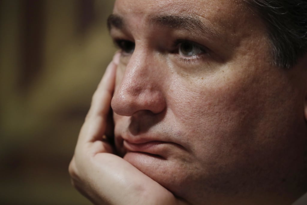 Senator Ted Cruz of Texas listens to Ford's testimony.