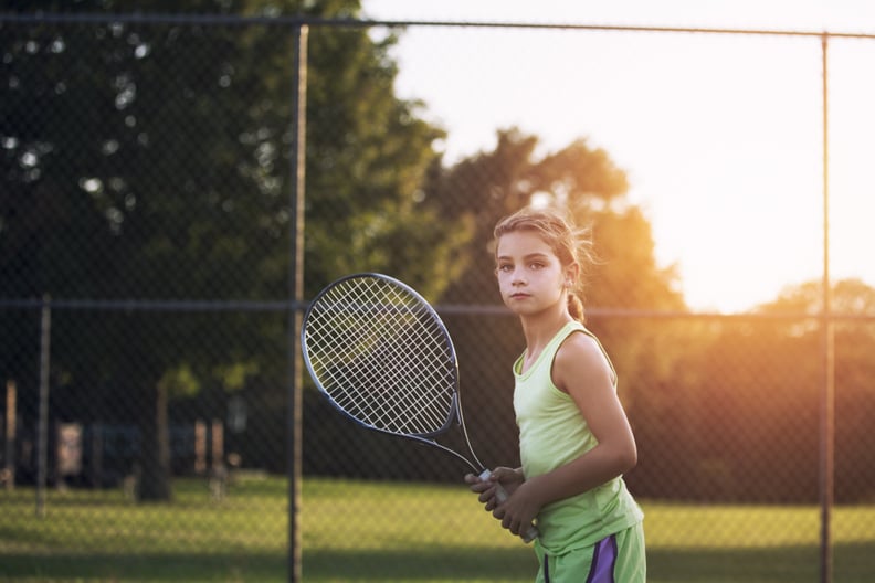 girl with tennis racket