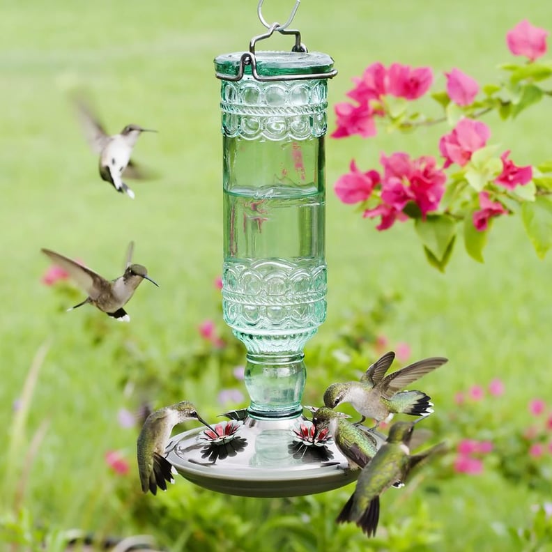 An Antique Feeder: Perky-Pet Green Antique Bottle Decorative Glass Hummingbird Feeder
