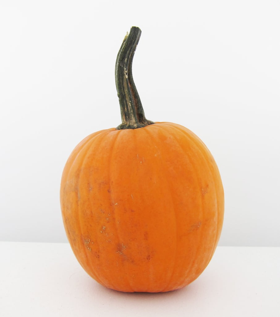 Materials needed: One medium to small-sized pumpkin, studs/embellishments, and metallic spray paint.