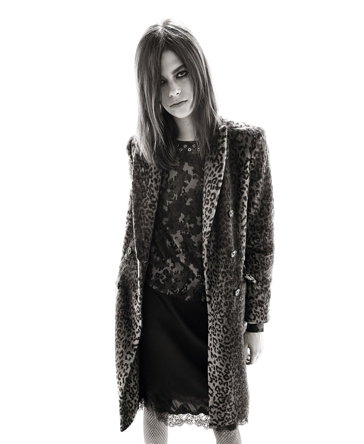 Print mixing in a leopard-print coat, camo cashmere sweater, and romantic lace-hem skirt