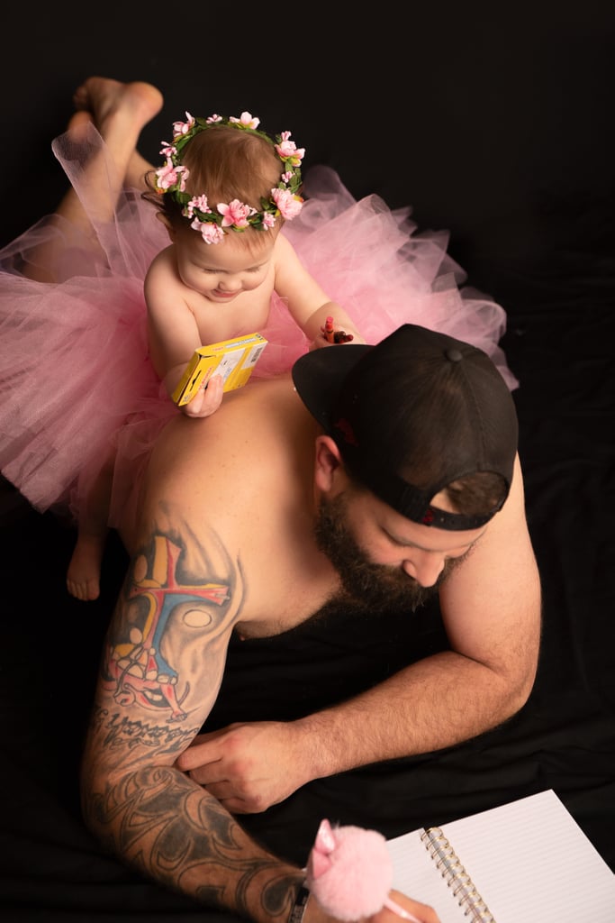 Dad and Baby Daughter Wear Matching Tutus For Photo Shoot