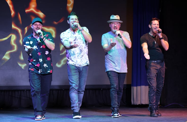 PROVIDENCIALES, TURKS AND CAICOS - AUGUST 31:  Drew Lachey, Nick Lachey, Justin Jeffre and Jeff Timmons are seen performing on stage during the 98 Degrees Ultimate Throwback Concert at Beaches Turks & Caicos Resort Villages & Spa on August 31, 2022 in Pro