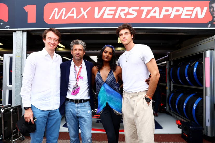MONTE-CARLO, MONACO - MAY 29: (L-R) Frédéric Arnault, CEO of TAG Heuer, Patrick Dempsey, Simone Ashley and Jacob Elordi, pose for a photo outside the Red Bull Racing garage ahead of the F1 Grand Prix of Monaco at Circuit de Monaco on May 29, 2022 in Monte