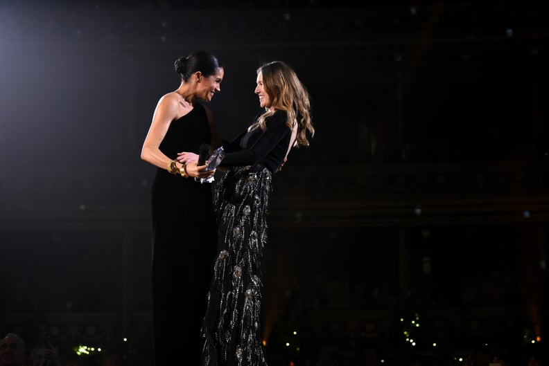 LONDON, ENGLAND - DECEMBER 10: Meghan, Duchess of Sussex presents the award for British Designer of the Year Womenswear Award to Clare Waight Keller for Givenchy during The Fashion Awards 2018 In Partnership With Swarovski at Royal Albert Hall on December