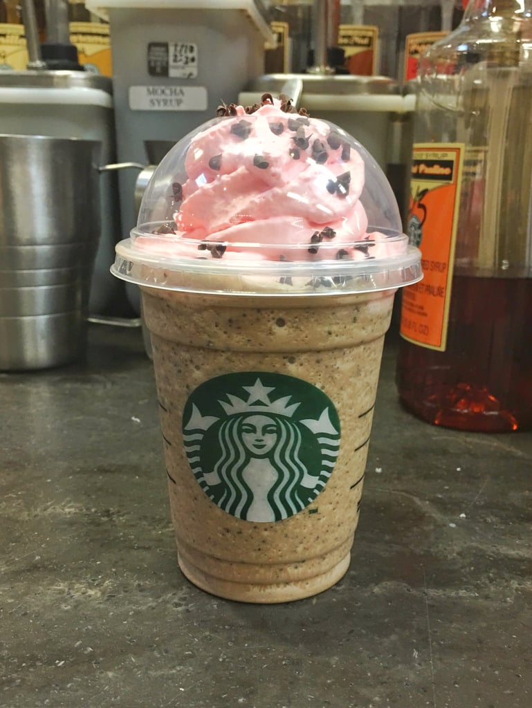Java Chip Frappuccino topped with raspberry-infused whipped cream and chocolate curls.
