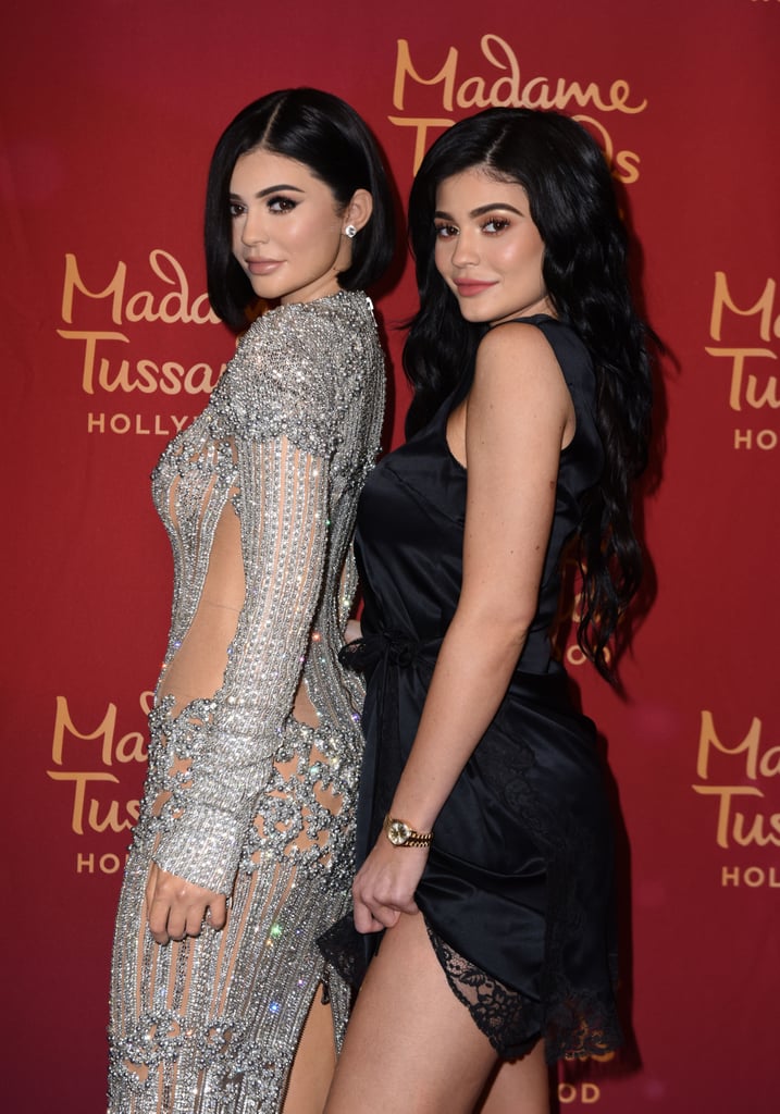 Kylie Jenner turned up at Madame Tussauds in Hollywood on Tuesday night to unveil her wax figure. The racy reality TV star posed for photos on the red carpet with her double wearing a sexy black dress, while the wax figure was done up in a silver gown inspired by Kylie's 2016 Met Gala look — and needless to say, the resemblance was uncanny. The wax figure people really nailed everything about the 19-year-old, from her lips and eyebrows to her signature red carpet pose. It was so accurate that apparently Kylie's family members couldn't even tell the difference; Kylie shared an Instagram photo of herself and the figure wearing Snapchat filters, writing, "I made her FaceTime my whole family . . . fooled everyone." She's the puppy on the left, by the way.
