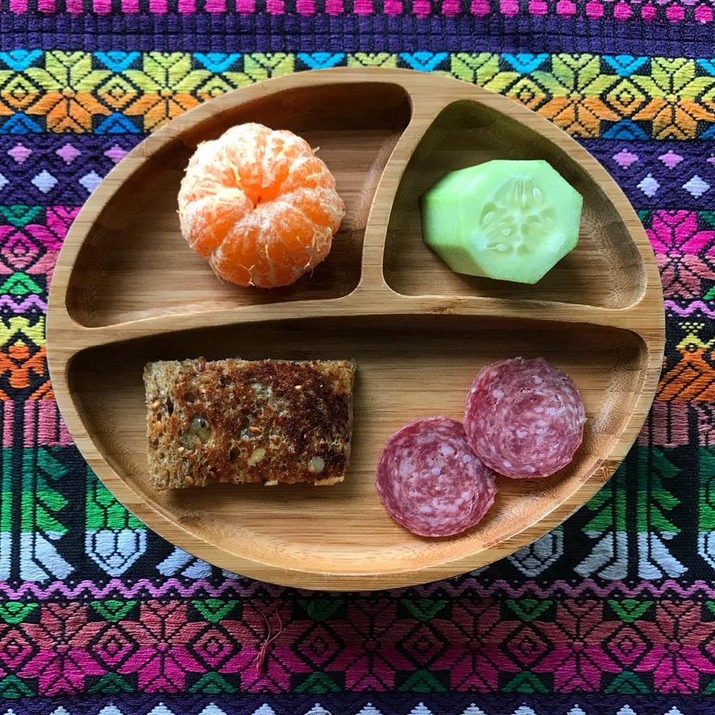 "Lunch: grilled cheese sandwich on whole grain bread, salami, cucumber, and a clementine."