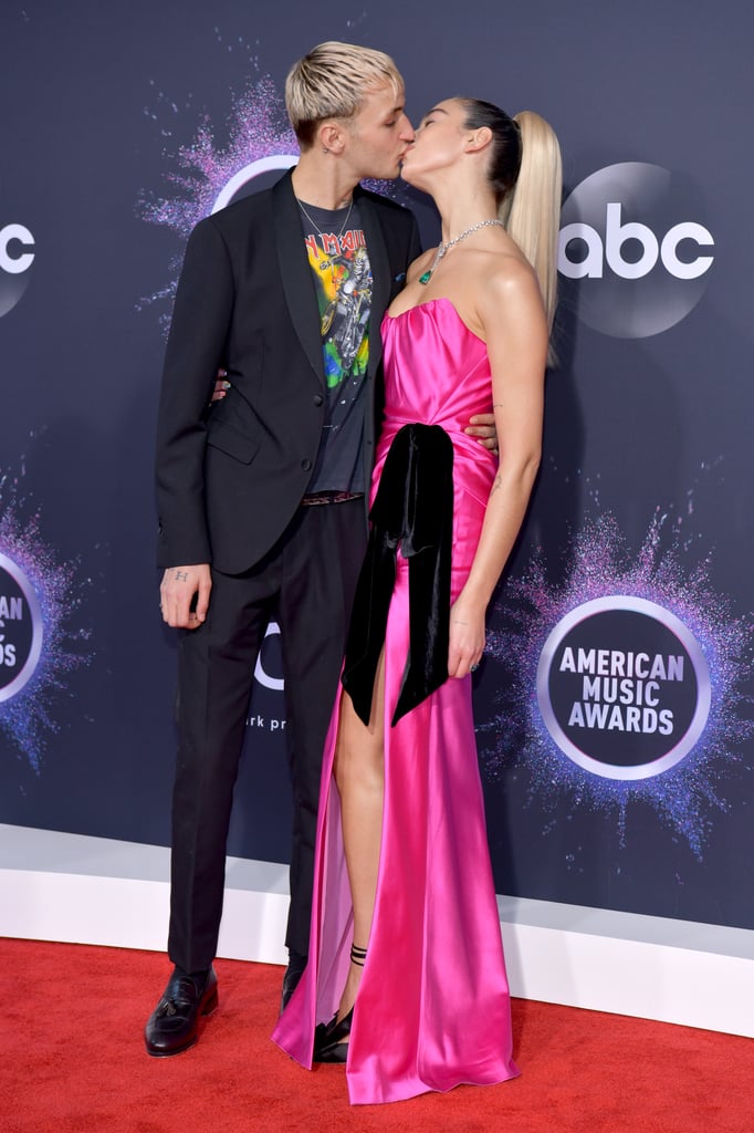 Now tell me this doesn't make your heart soar? We love that Anwar kept it casual by pairing his suit with a t-shirt, and Dua opted for a pink gown with a giant bow.