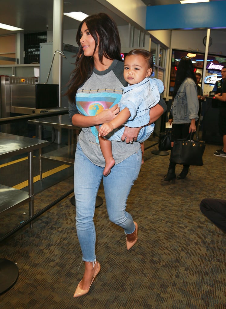 Kim Kardashian Carrying North West in LAX | Photos | POPSUGAR Celebrity