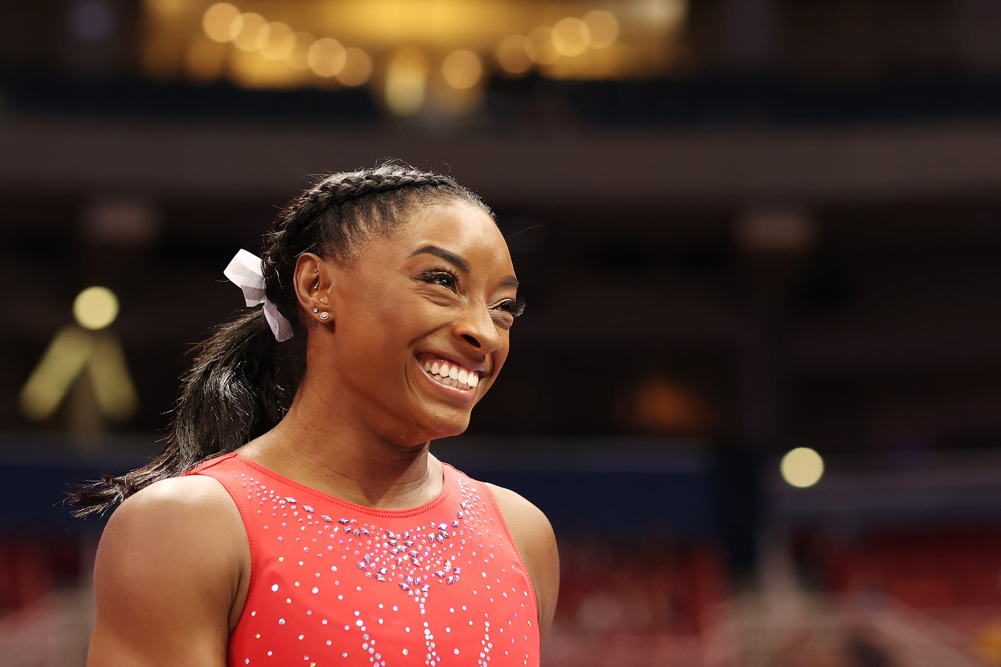 ST LOUIS, MISSOURI - JUNE 27: Simone Biles reacts during warm ups prior to the Women's competition of the 2021 U.S. Gymnastics Olympic Trials at America's Center on June 27, 2021 in St Louis, Missouri. (Photo by Carmen Mandato/Getty Images)