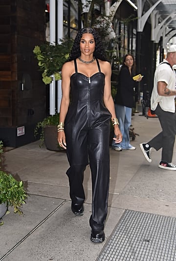 Ciara Wears LITA by Ciara Leather Jumpsuit and Celine Boots