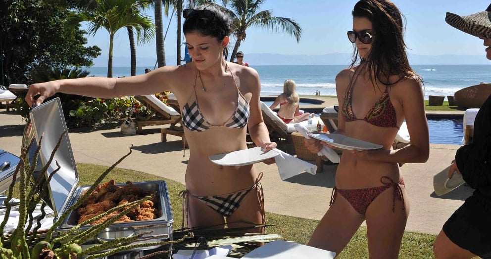 Kendall and Kylie grabbed food from a buffet. 
Source: Casa Aramara