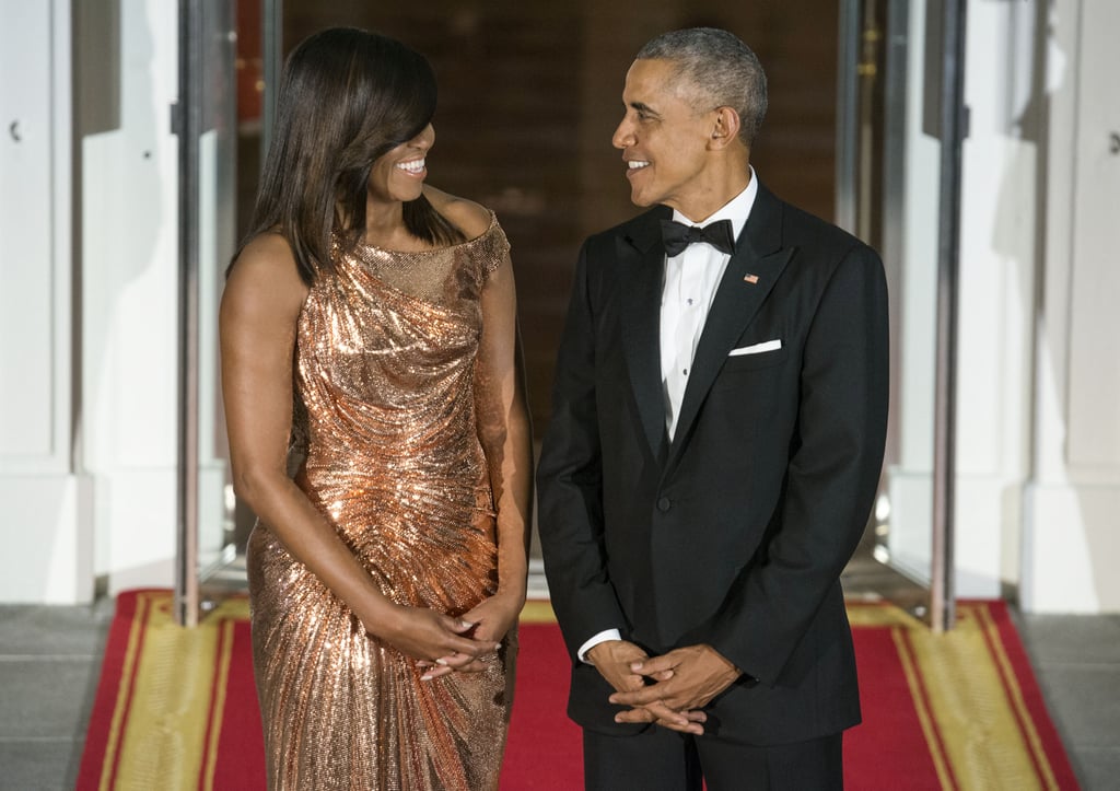 Before the Italian prime minister arrived at the 2016 state dinner, Michelle and Barack exchanged matching grins.