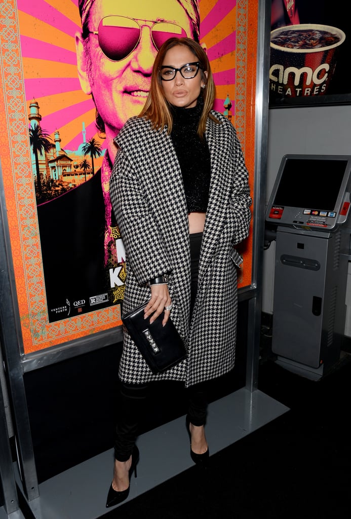 Jennifer Lopez gave glasses a go, pairing the statement accessory with a houndstooth coat and a black crop top ensemble.