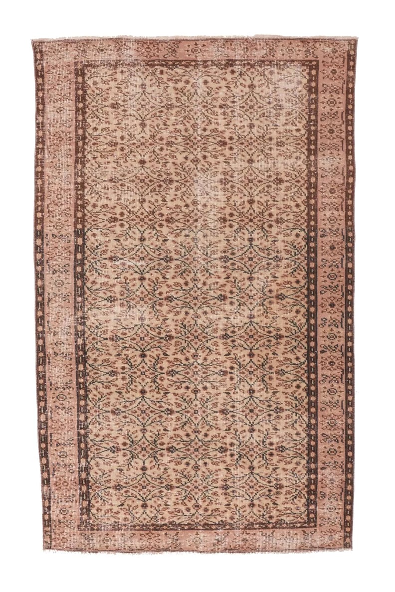 An Area Rug: Canary Lane Vintage Area Rug No. 1552