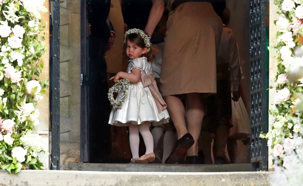 The little princess gave photographers one last glance before walking down the aisle at Pippa's wedding to James Matthews in May.