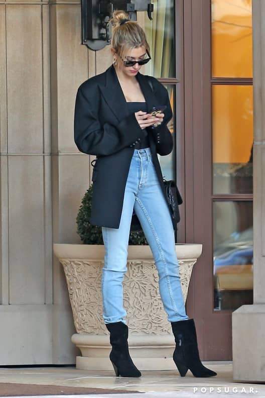 Hailey Baldwin Dons a Bodysuit, Ray-Bans, and Gucci Bag in New