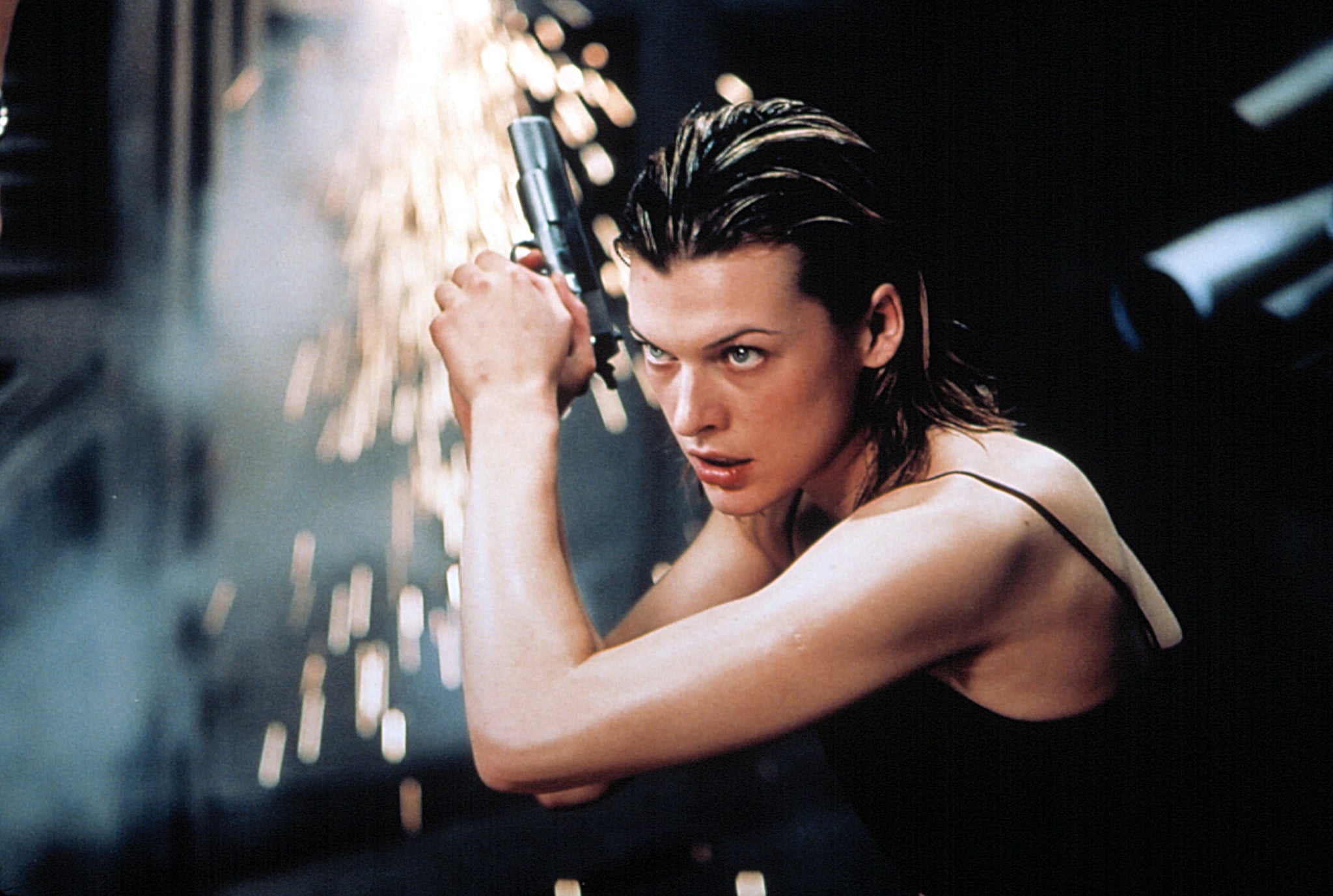 RESIDENT EVIL, Milla Jovovich in movie based on the popular video game, 2002(c) Columbia/courtesy Everett Collection.
