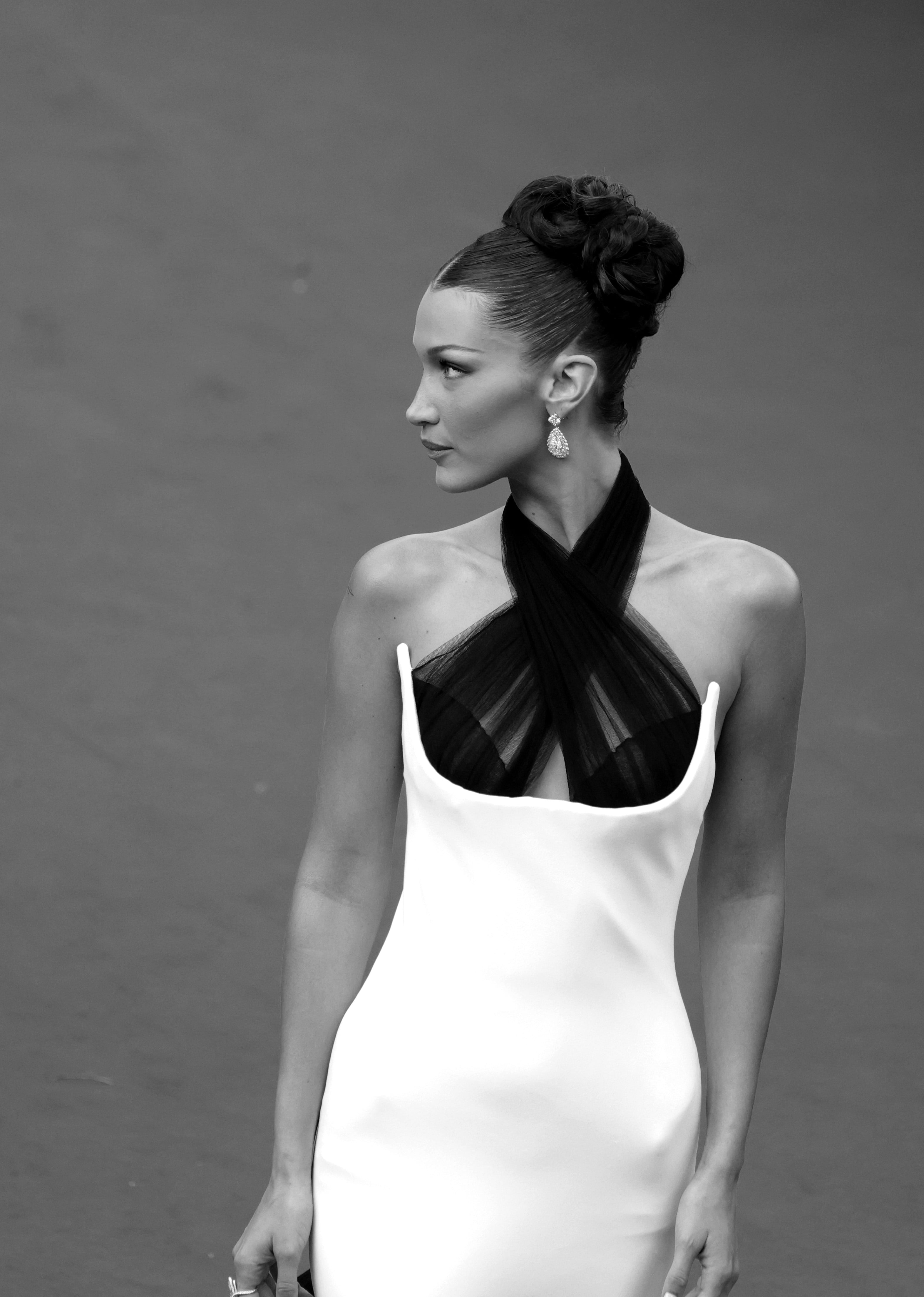 bella hadid black and white dress Bella Hadid Kicks Off the Cannes Glamour in a Dress With a Heck of a Train