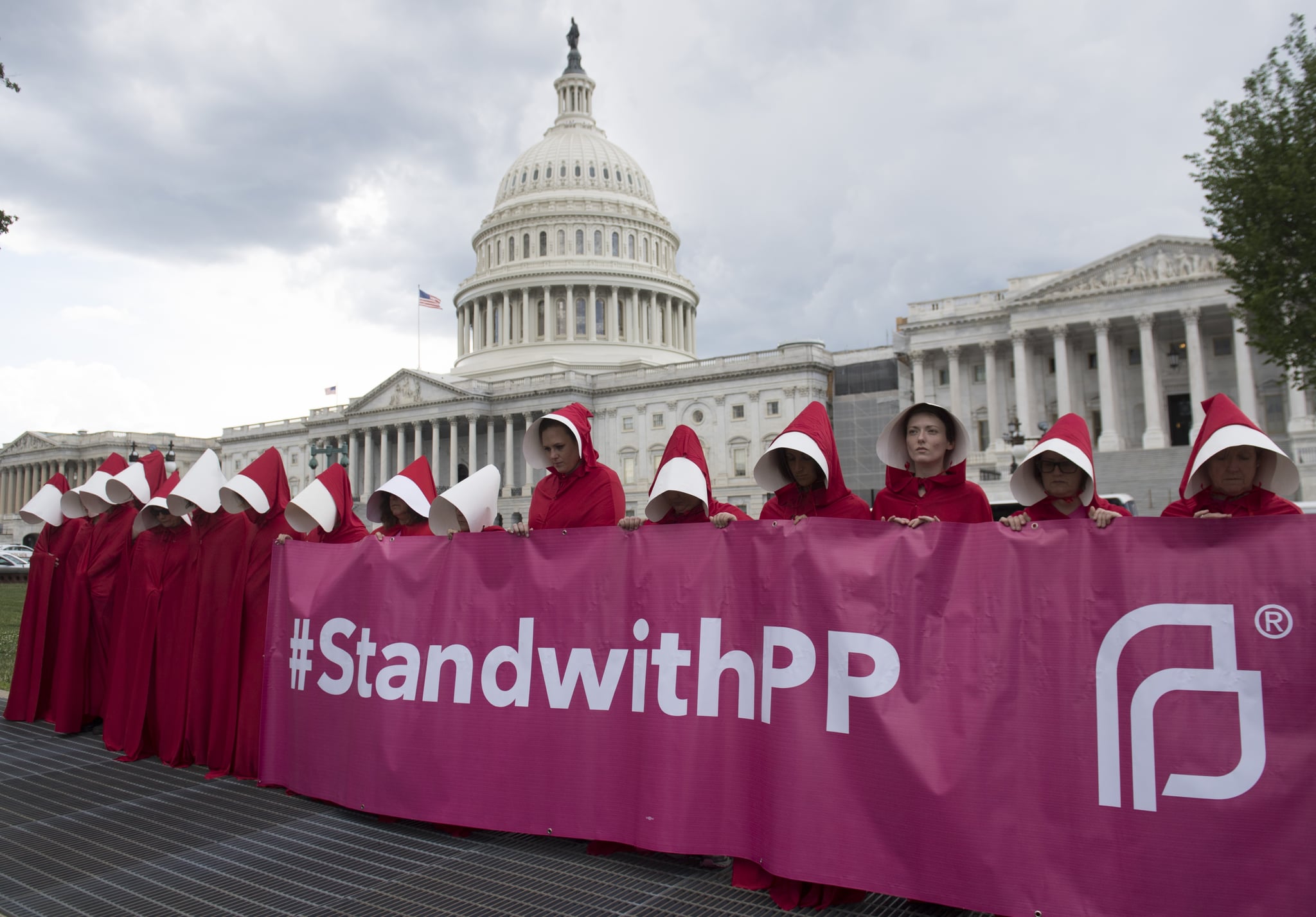 Supporters of Planned Parenthood dressed as characters from 