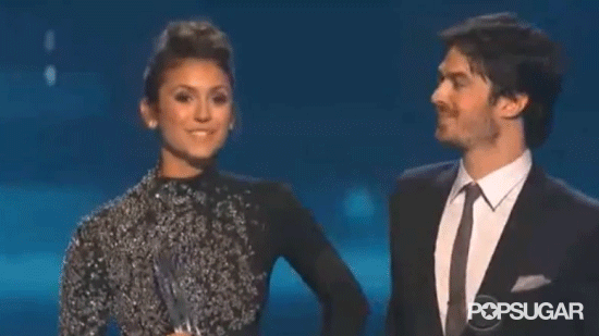 Ian Somerhalder planted an adorable kiss on Nina Dobrev after they picked up the honor for favorite onscreen chemistry — and fans went wild.