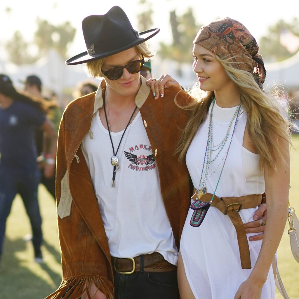 Cody Simpson's Western-inspired outfit looked just right with Gigi Hadid's boho-cool look: a white breezy dress, a neutral belt, turquoise beads, and a complementing head scarf.