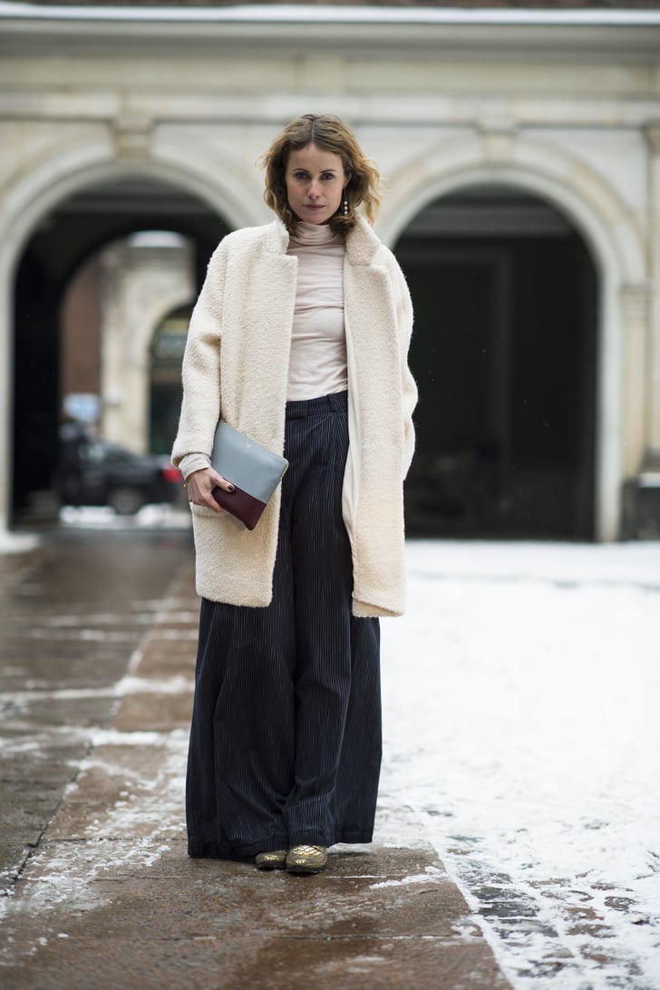 Wide-leg pants further the vintage flair of a fuzzy coat. | 70+ Winter ...